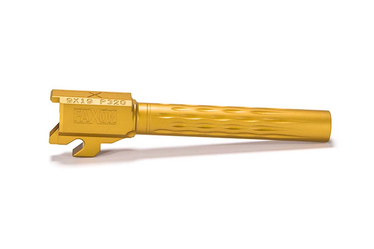 A gold-toned custom SIG pistol barrel